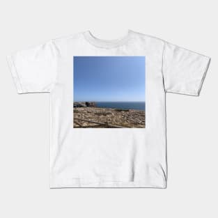 A cliff & the ocean Kids T-Shirt